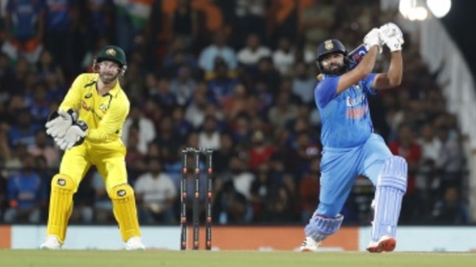 Rohit Sharma lofts Adam Zampa over the off side