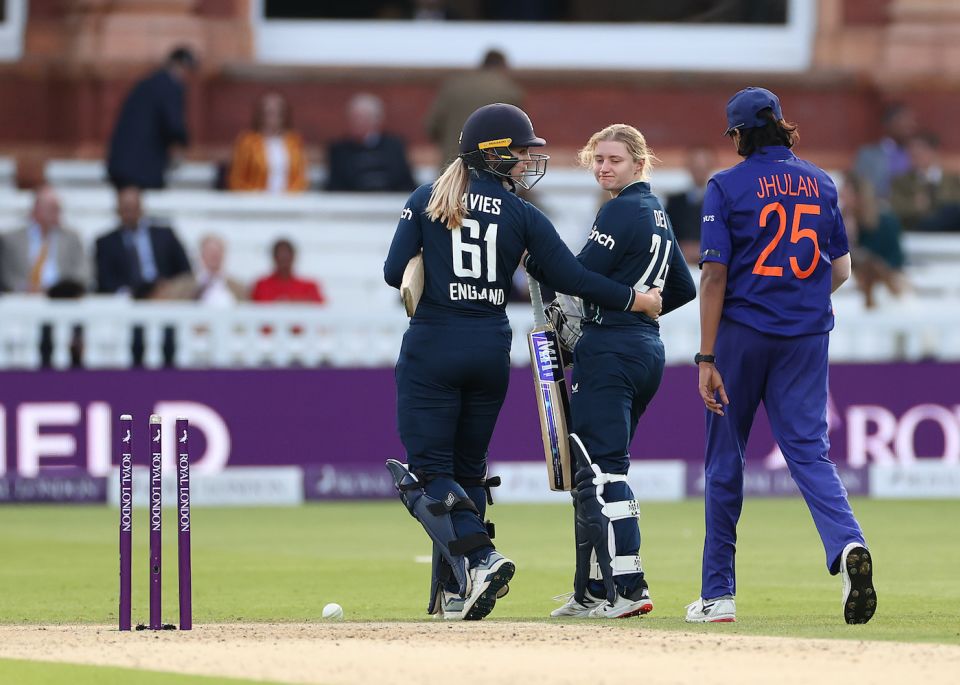 Charlie Dean gets a consolatory word from Freya Davies and Jhulan Goswami