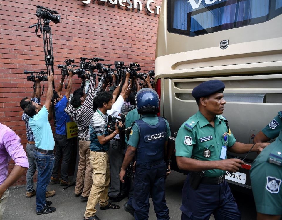 A forest of cameras greets the England squad as they arrive in Dhaka for a nets session