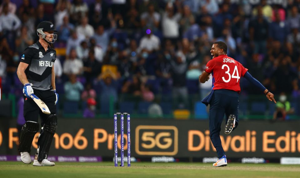 Chris Jordan thinks he has Jimmy Neesham out in last year's World Cup semi-final, but the decision was overturned on review. Neesham ended up getting 23 runs off Jordan's over