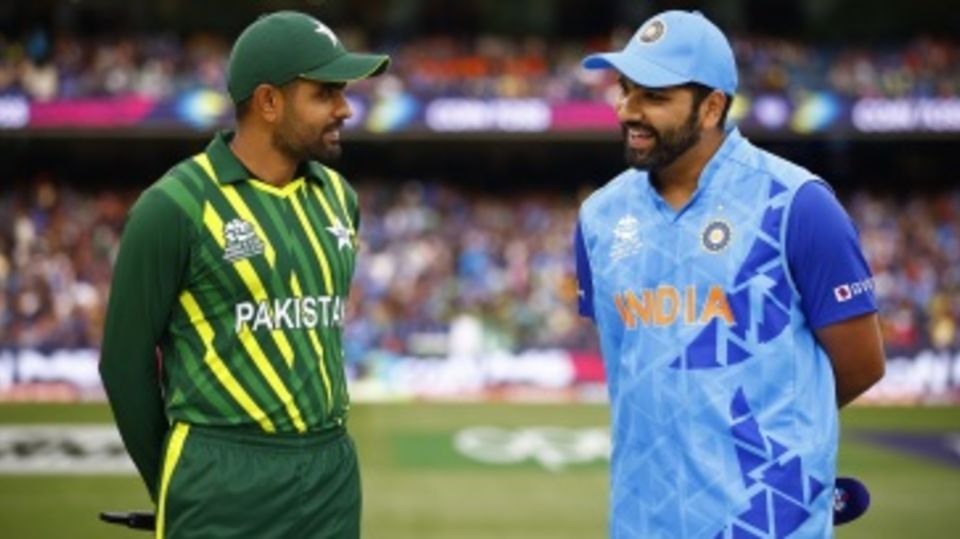 Rohit Sharma and Babar Azam catch up during the toss