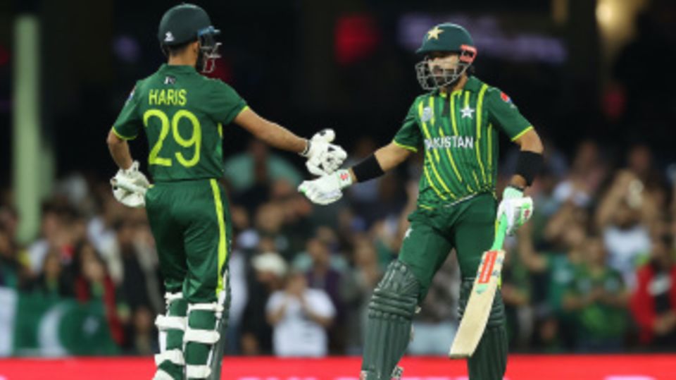 Mohammad Rizwan is congratulated upon reaching fifty by Mohammad Haris