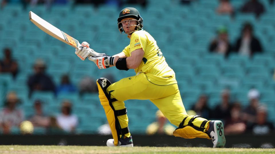Steven Smith gets down to paddle a sweep