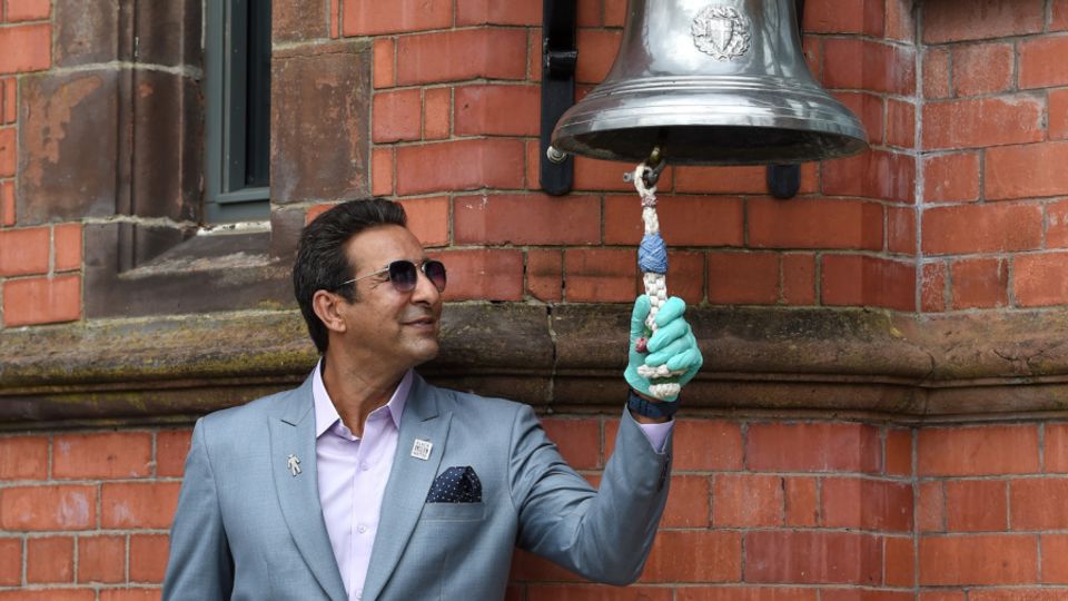 Akram rings the bell at Old Trafford during the 2020 Pakistan Test there. Of all the things you might accuse him of, not being around is not one