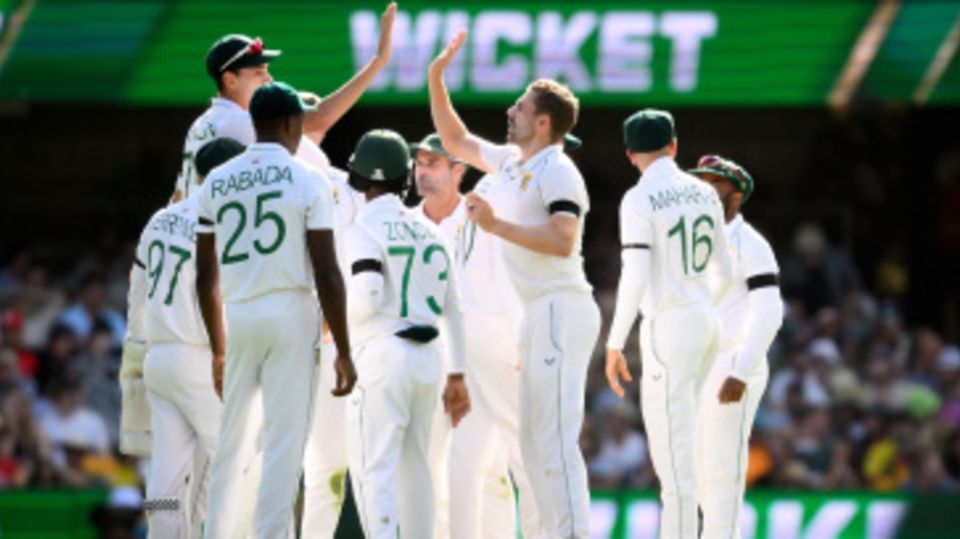 Anrich Nortje is congratulated by team-mates after he removed Usman Khawaja