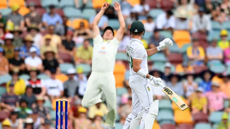 Cameron Green leaps in the gully to catch Sarel Erwee