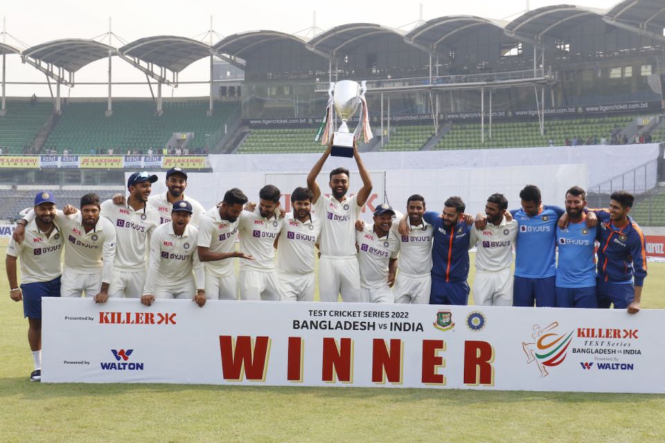 Unadkat holds the trophy aloft after the Test series win in Bangladesh in December