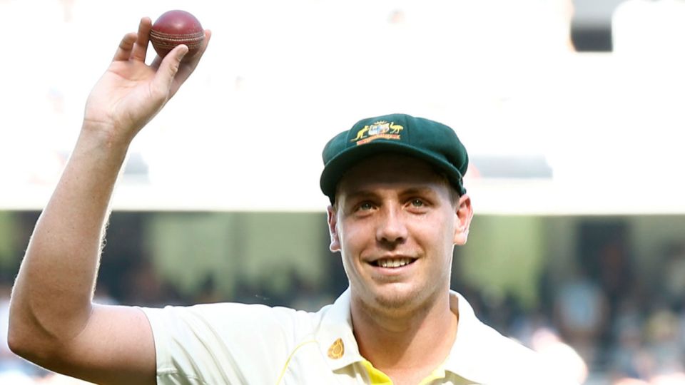 Cameron Green walks off with the ball after his five wickets
