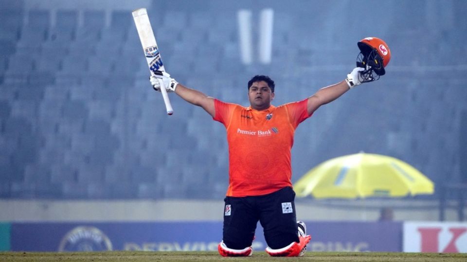 Azam Khan celebrates after reaching his maiden T20 century