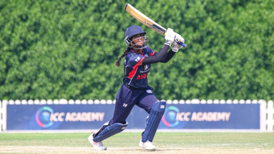 Allrounder Ritu Singh drives over mid-off during USA's tour of the UAE
