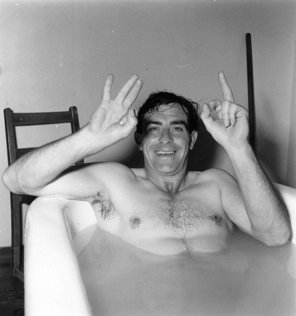 A bird in the bath: Fred Trueman soaks in his record