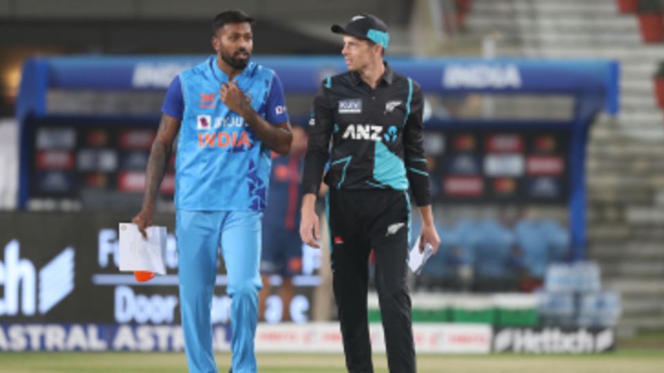 Hardik Pandya and Mitchell Santner come out for the toss