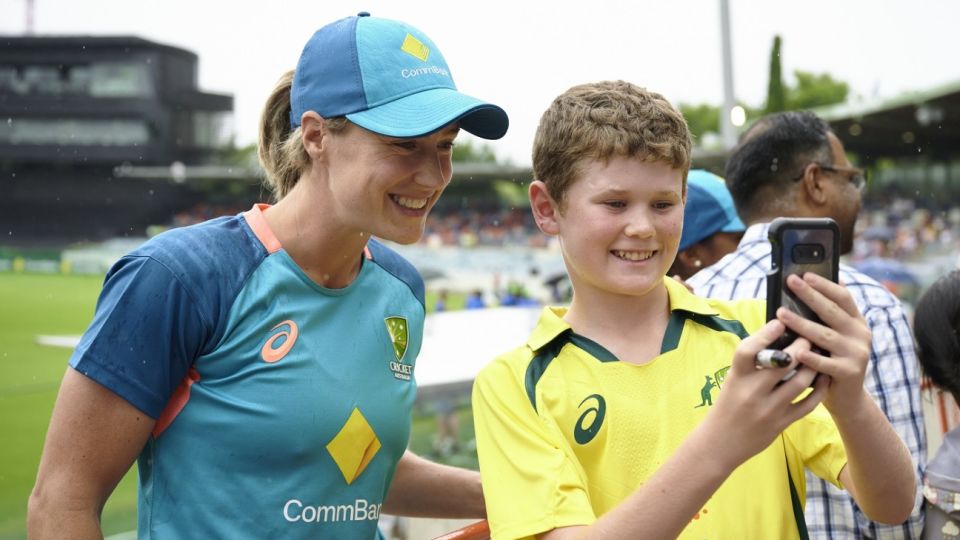 Ellyse Perry with a fan