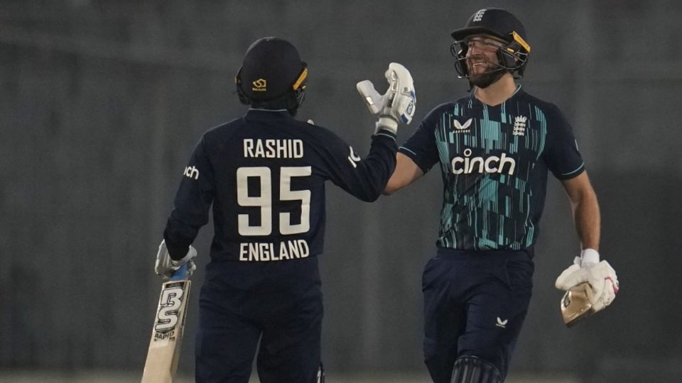 Dawid Malan and Adil Rashid get together after sealing a tricky chase in the first ODI