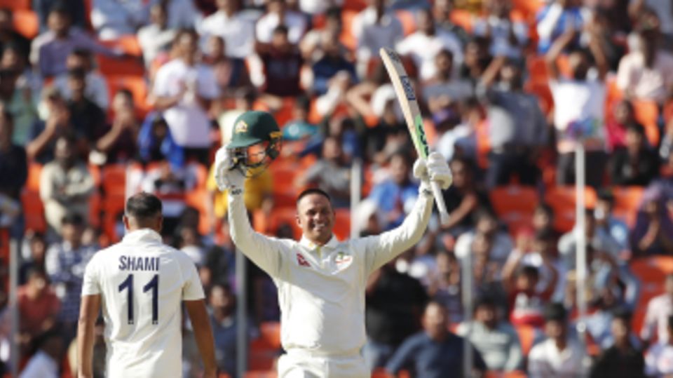 Usman Khawaja soaks in the applause for his hundred