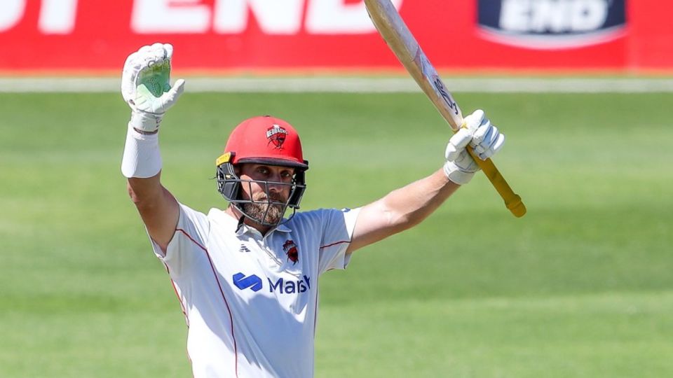 Jake Lehmann celebrates his century