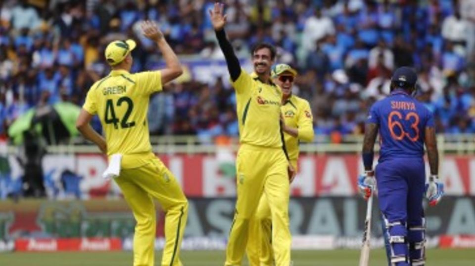 Mitchell Starc celebrates trapping Suryakumar Yadav lbw