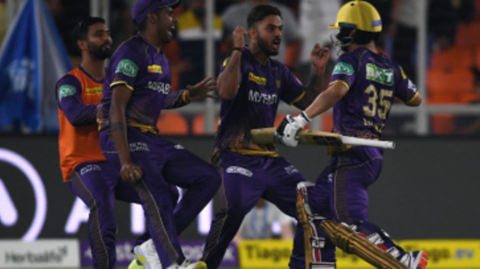 A jubilant Nitish Rana runs in to celebrate with Rinku Singh