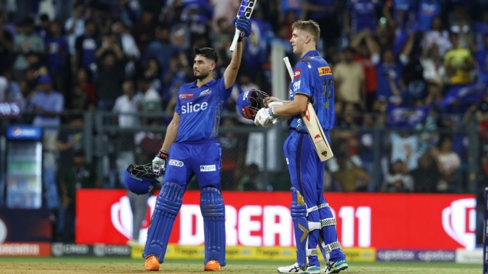 Nehal Wadhera celebrates after bringing up his fifty with the winning runs