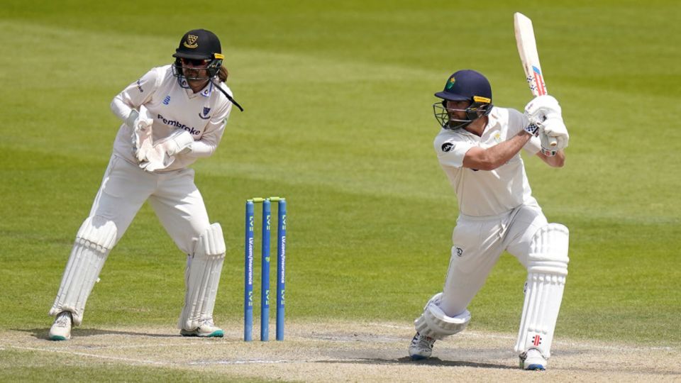 Michael Neser drives through the covers during his final-day century