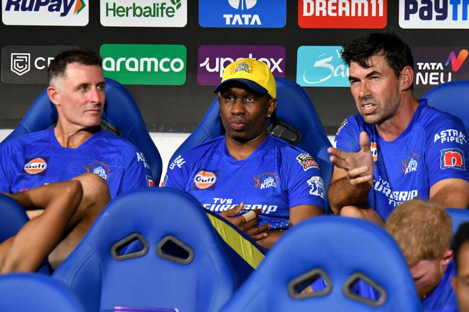You can't take CSK out of the man: current batting and bowling lieutenants Mike Hussey and Dwayne Bravo, former Chennai players, like Fleming, on the sidelines of a game last year