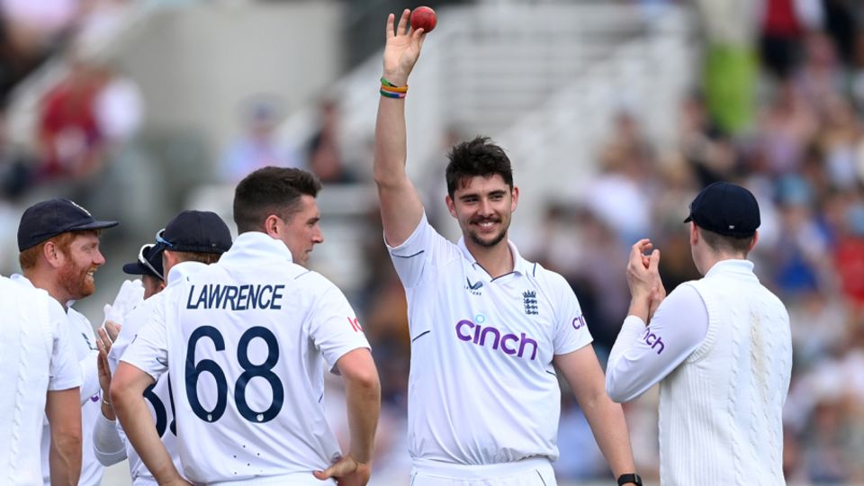 Josh Tongue holds the ball aloft for his five-for on Test debut