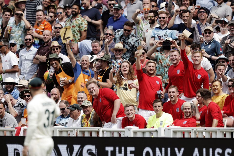 Copping it rough: David Warner gets taunted by sandpaper-waving fans at the Edgbaston Ashes Test in 2019