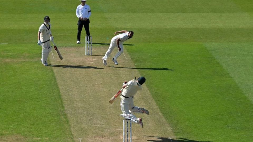 Travis Head does all he can to get out of the ball's way