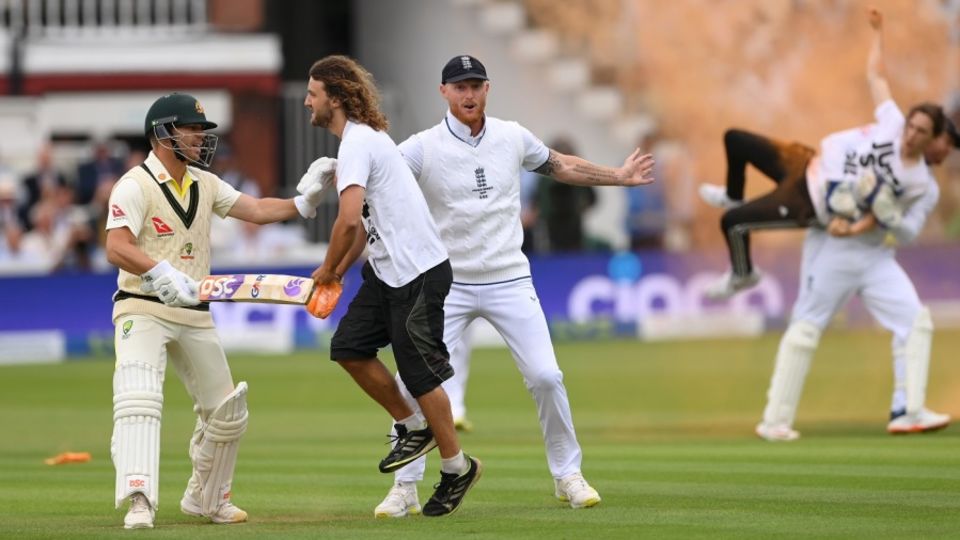 Warner and Stokes attempt to stop a Just Stop Oil protester as Bairstow tackles the other