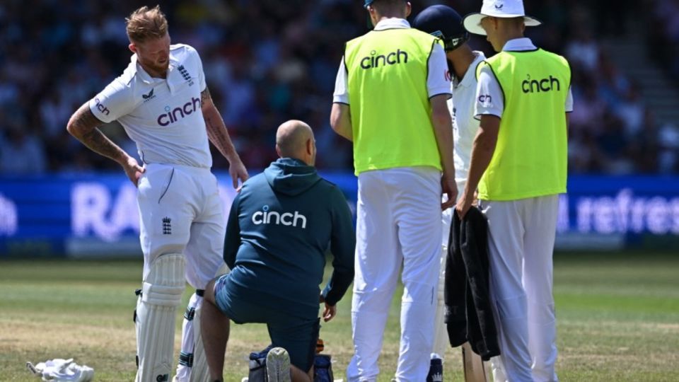 Ben Stokes gets some treatment on his hip