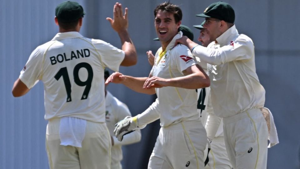 Pat Cummins celebrates a wicket