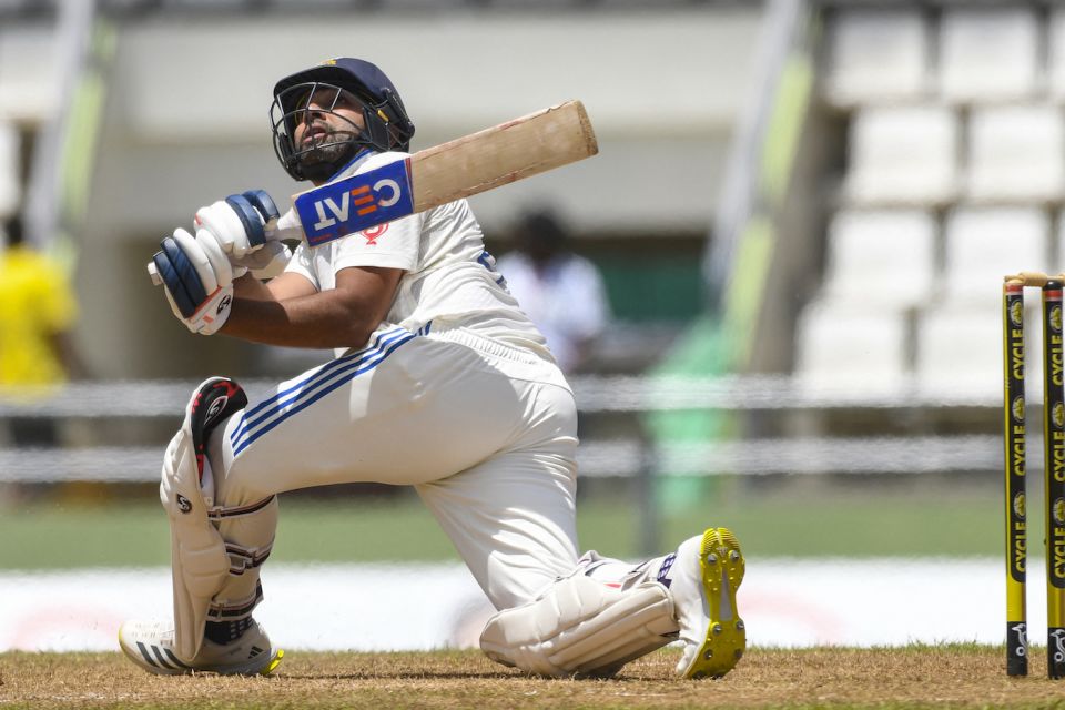 Rohit Sharma plays a slog sweep on his way to 103 against West Indies