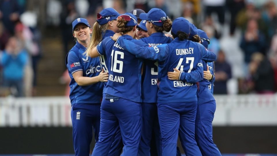 England players celebrate after the final wicket fell