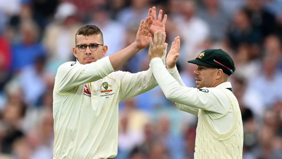 Todd Murphy celebrates with David Warner after dismissing Mark Wood