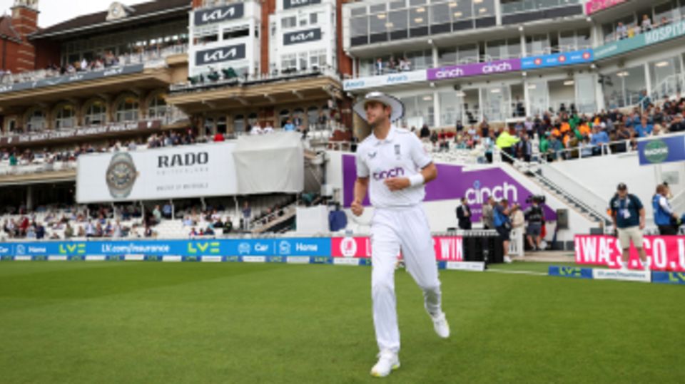 Stuart Broad walks onto the field of play for the final day of his Test career