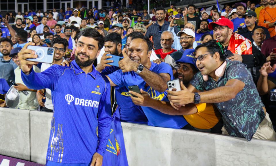 MI New York star Rashid Khan takes selfies with fans after his team MI New York won the inaugural MLC