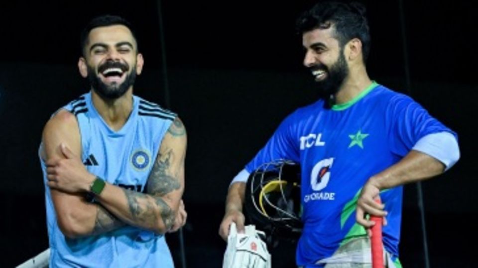 Virat Kohli and Shadab Khan share a light moment