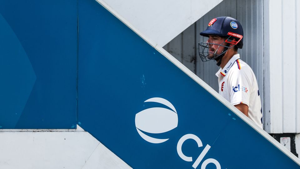 Alastair Cook walks up the steps to the dressing room after being dismissed