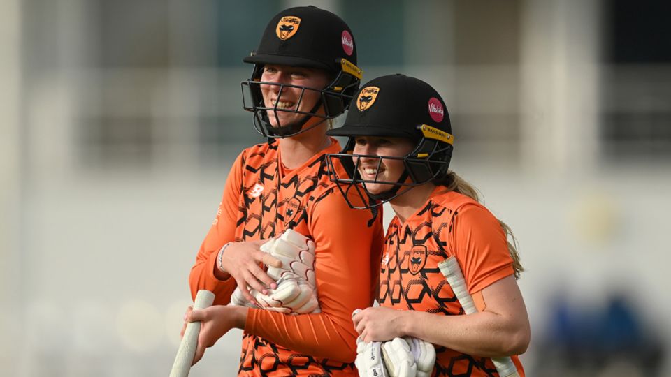 Freya Kemp and Emily Windsor leave the field after Southern Vipers won the Rachael Heyhoe Flint Trophy Final