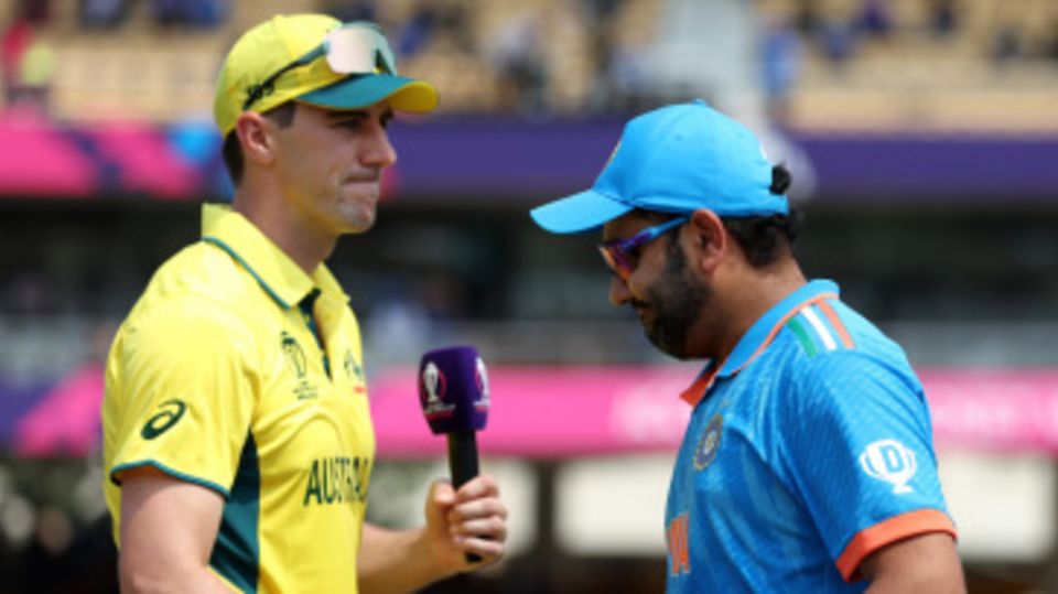 Rohit Sharma and Pat Cummins shake hands