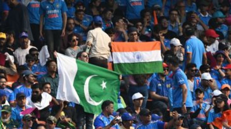 Indian and Pakistani fans fly their flags