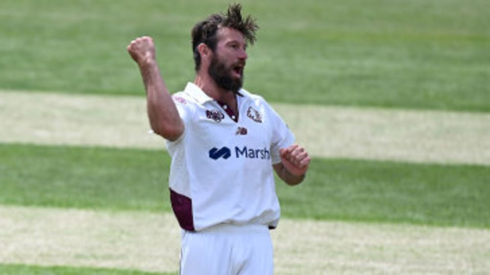 Michael Neser celebrates his first wicket of the match