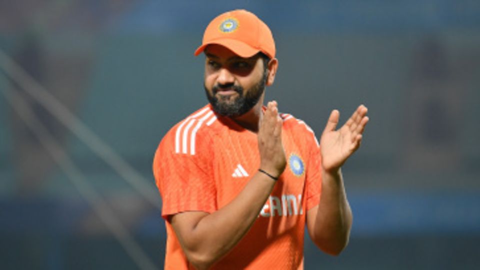 Rohit Sharma is impressed by something during a practice session on the eve of the game against South Africa