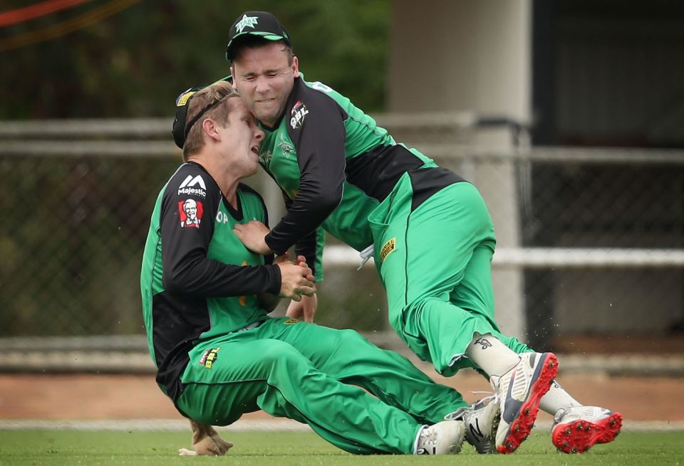Two to tangle: Adam Zampa and Tom Triffitt are not enjoying this impromptu game of human Tetris