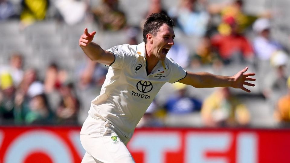 Pat Cummins wheels away in celebration after cleaning up Babar Azam