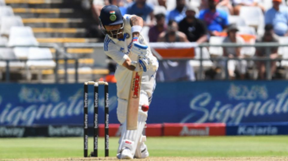 Virat Kohli plays the ball off the front foot