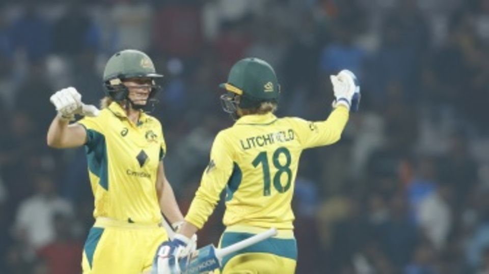 Ellyse Perry and Phoebe Litchfield celebrate victory