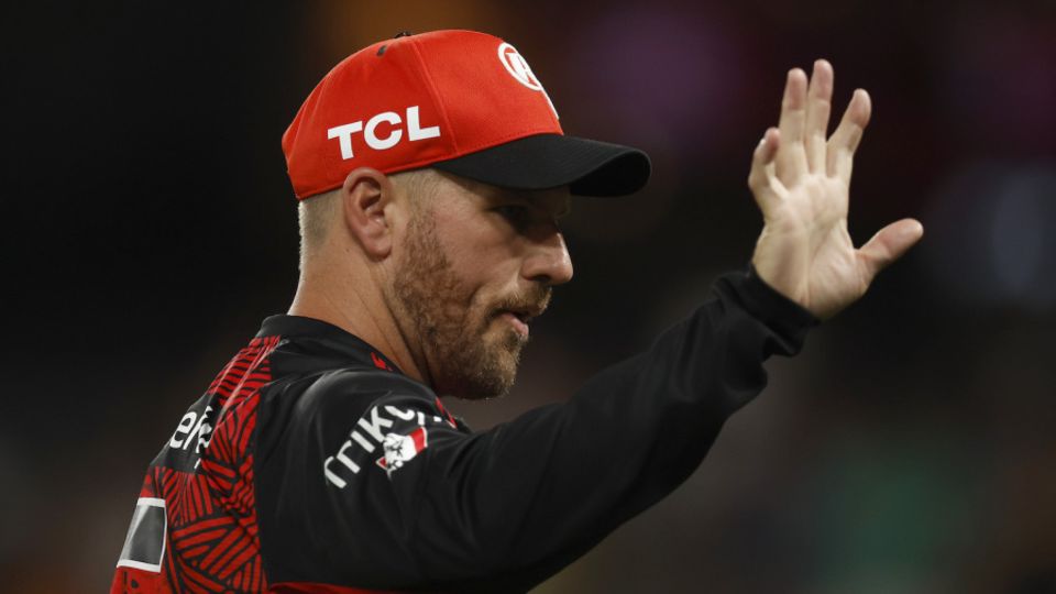 Aaron Finch acknowledges the cheers from the stands during his farewell game