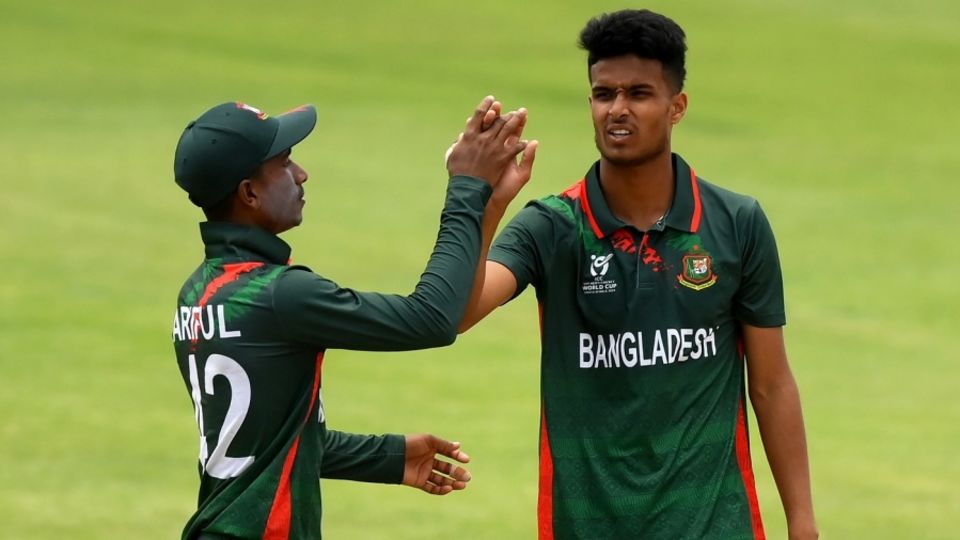 Ariful Islam and Rohanat Doullah Borson celebrate Akash Chand's wicket