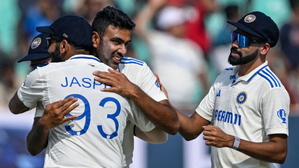 Jasprit Bumrah hugs R Ashwin after his 500th wicket